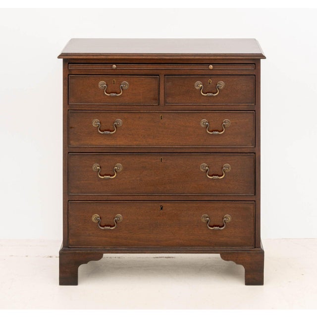 George III Style Mahogany Chest of Drawers, with brushing slide above two short drawers and three long drawers with brass...