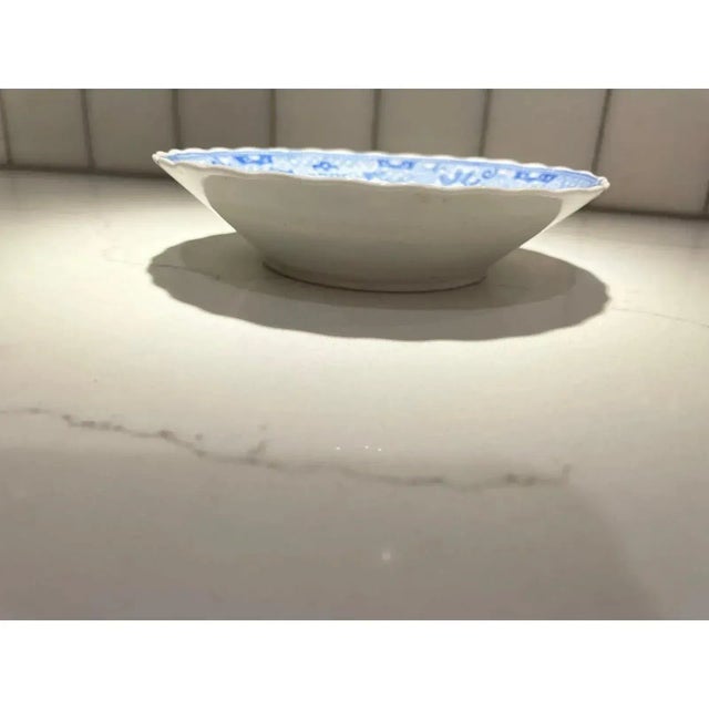 This beautiful antique decorative bowl features a blue & white chinoiserie design. Lovely to use for keys, jewelry, nuts,...