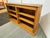 Design Plus Gallery presents a Double Wide Golden Oak Wood Bookcase. The shelving has modular interior shelves that are...