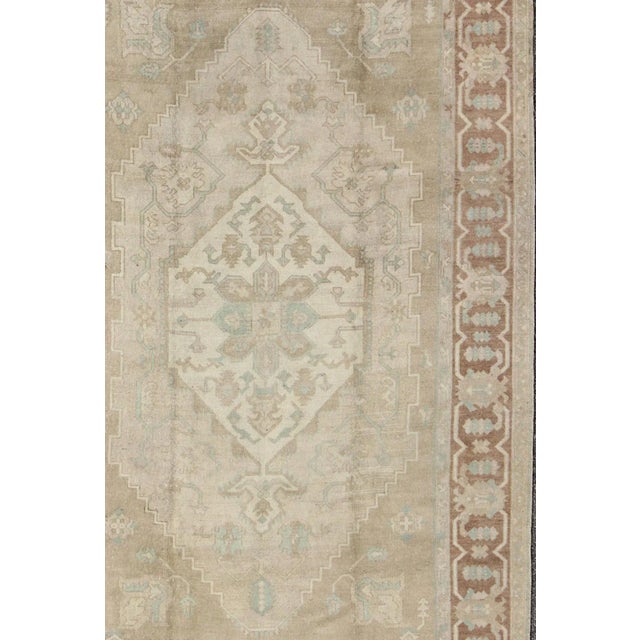 Textile Mid 20th Century Mid 20th Century Turkish Vintage Oushak Medallion Rug With Muted Colors in Earth Tones For Sale - Image 7 of 11