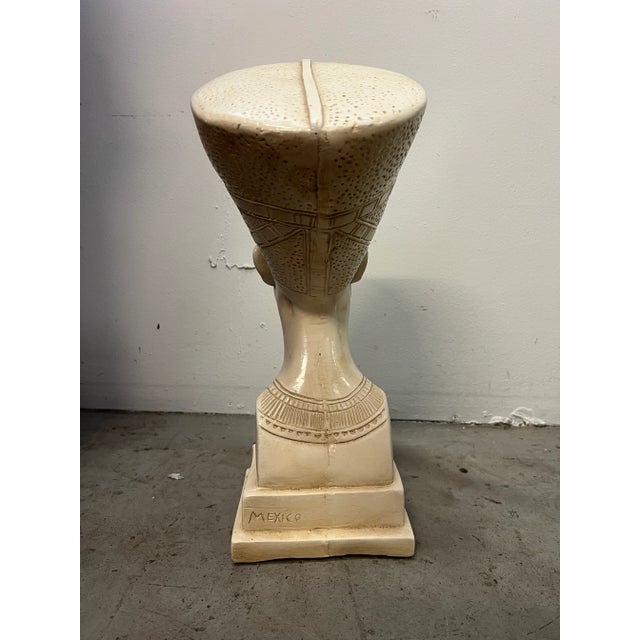 1980’s Egyptian revival chalkware Statue of Nefertiti, the Egyptian queen of Akhenaten. Measures 19” tall. 9.5” wide x...