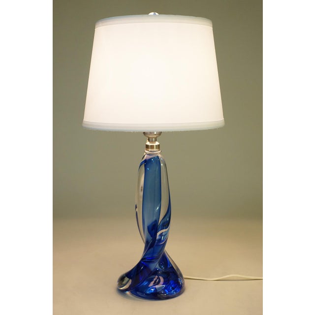 A visually dynamic and elegantly styled heavy solid Art Glass sculpture Marine Blue Swirl table lamp designed and produced...