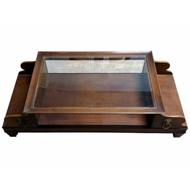 This elegant, vintage-inspired coffee table brings a touch of classic sophistication to any living space with its striking...