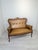 Chippendale Leather Two-Seater Sofa from the 1960s This 1960s Chippendale-style two-seater sofa with springs is...