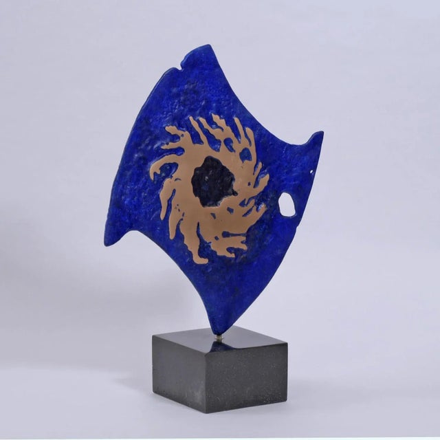 Bronze on a slate composite base Series of unique variations Stamped with monogram signature and uniquely numbered 765A...