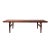 An exquisitely designed coffee table in Brazilian rosewood with shapely turned legs and dramatic rosewood grain detail...