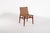 The very rare Jørgen Høj Teak and Rattan Chair for Thorald Madsen is a prime example of 1950s Danish modern design....