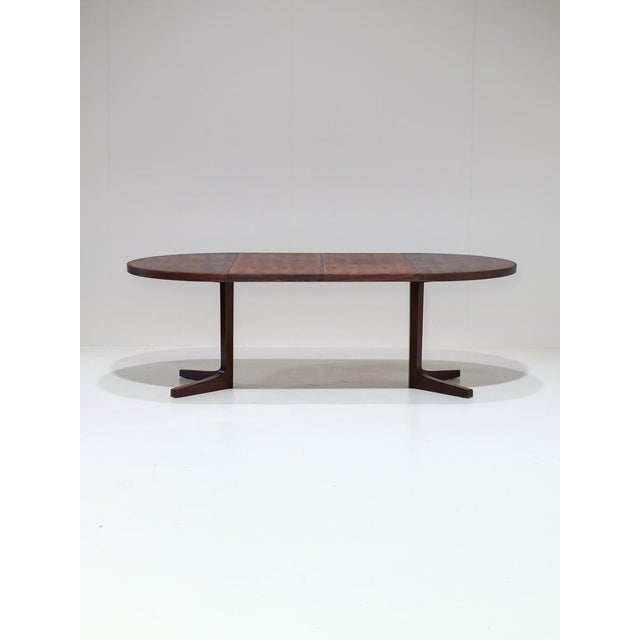 Extendable Dining Table in Rosewood, Denmark, 1960s, in Very Good conditions. Designed 1960 to 1969