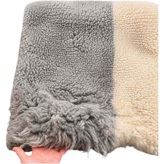 Textured West Elm pillow cover has two tone design with grey and cream colors. Face is wool blend, back is cotton. Has...
