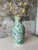 Add timeless color and global charm to your space with this beautiful vintage-style porcelain vase. This elegant piece...