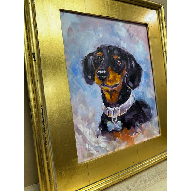 This contemporary Dachshund puppy oil painting on board is signed by artist Paco C for Paco and Company Painting measures:...