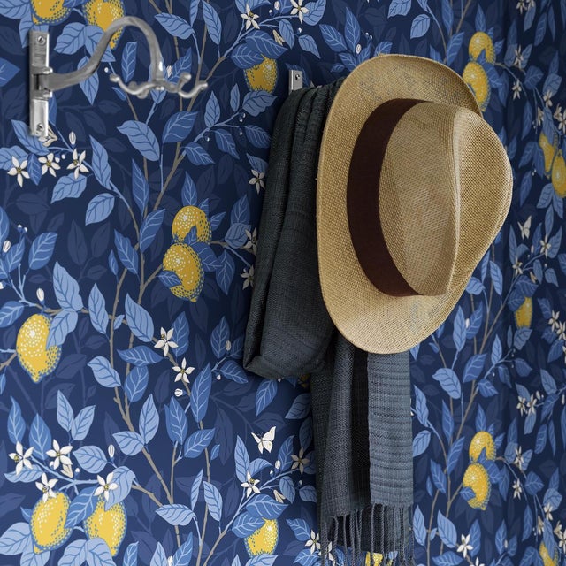 Derived from a hand-painted pattern of lush flowering lemon trees and delicately rendered butterflies, Boråstapeter’s...