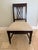 A latticework back and square-tapered leg chairs in cello finish. Crafted from solid agathis Seat height: 19” Squared,...