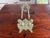 Art Nouveau brass easel with beautiful inspired scrollwork and decorative detailing throughout. At approximately 8.5"...
