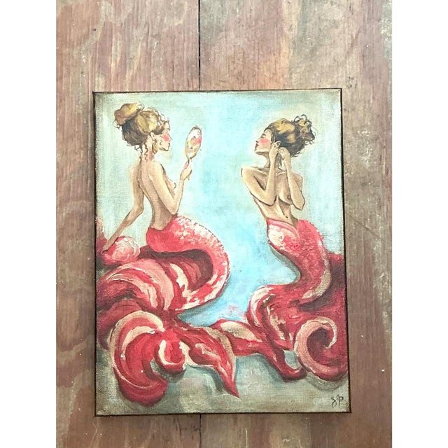 This vintage oil painting on canvas presents a whimsical, mirrored composition of two mermaids seated back to back, each...