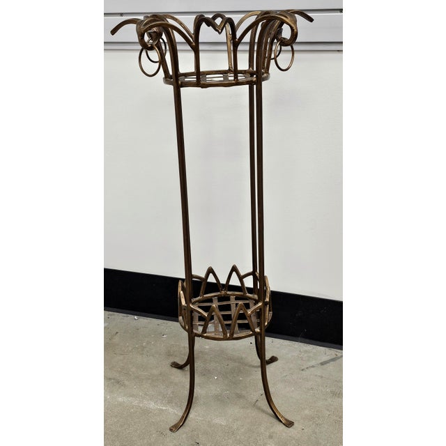 A late 20th Century Pier Luigi Colli Style Forged Wrought Golden Iron Tiered Plant Stand. Measures 21.5" in width, 21.5"...