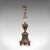 This is an antique candle pricket. An English, ebonised oak and fruitwood candlestick, dating to the Georgian period,...