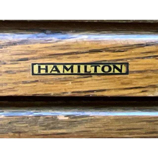 An exceptional vintage Hamilton large-format flat file cabinet in original oak finish, featuring 15 shallow drawers...