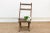 Antique folding ladderback chair, a rustic relic of the past: This antique folding ladderback chair, with its weathered...