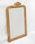 Antique french 19th century louis philippe style gold gilt mirror with an elegant small crest, a "faux" ribbon frame and...