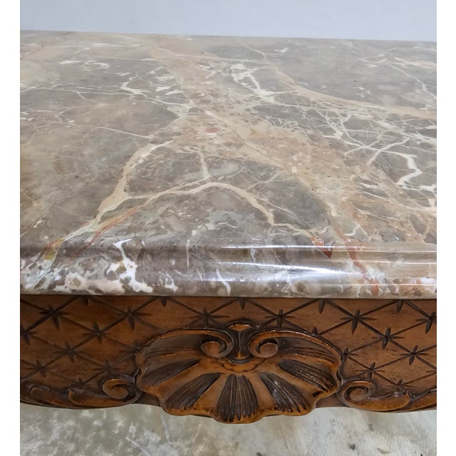 A mid century George II Style Carved Mahogany and Breccia Capraia Marble Top Accent Table in great vintage condition....