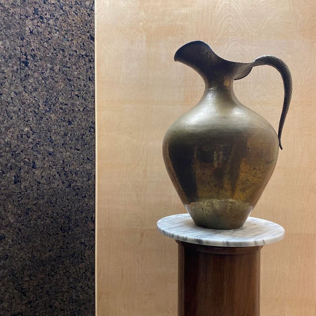 Remarkable large scale Italian pitcher in hammered brass texture by Egidio Casagrande. Egidio Casagrande was an Italian...