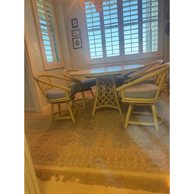 The dining set was purchased in 1986. Ficks Reed distressed pineapple bamboo dining table with white Formica top and 5...