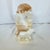 A substantial vintage Mexican carved-stone accent lamp depicting three polar bears climbing across a glowing iceberg,...