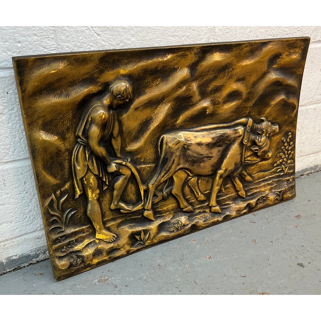 Add timeless character to your space with this striking bronze-tone relief plaque depicting a traditional farming scene....