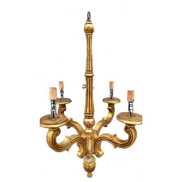 Lovely classic piece with hand carved frame, piece was a floor sample in a Michael Taylor showroom. Missing candle sleaves.
