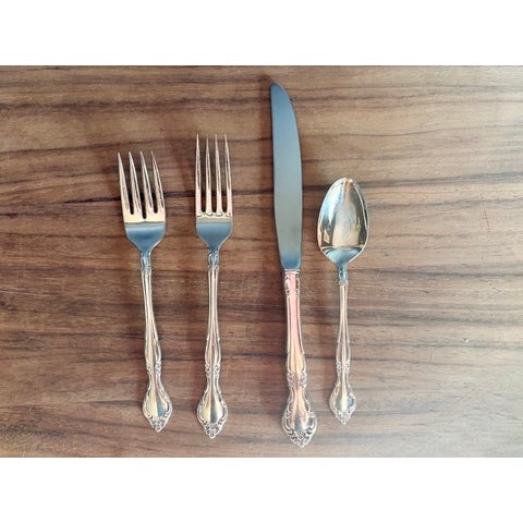 Partial service of Oneida Community silverplate flatware in the "Affection" pattern, introduced in 1960 and produced until...