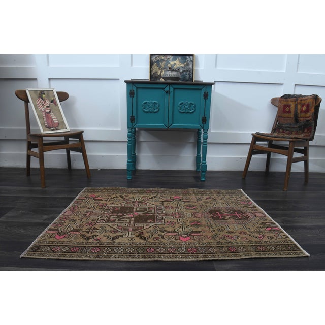 Vintage Hand-Knotted area rug is a semi-antique vintage area rug. The '70s Eastern region of Anatolia's unique rug is...