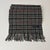 Burberry Grey Classic 100% Lambswool Scarf. Vintage Burberrys of London check in grey with black, white and red stripes,...