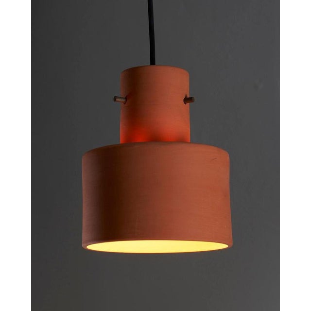 A rare find from the history of Dutch lighting, this terracotta pendant was produced by Artiforte in the 1950s. While...