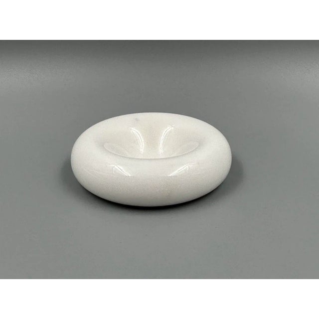 A small bowl * from up & up * Made in Italy, 1970s * from white Carrara marble * Height: 1.9 cm diameter: 6.8 cm * Very...