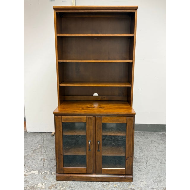 Design Plus Gallery presents the Printer's Storage Two Piece Bookcase by William Sonoma for Pottery Barn. Inspired by...