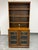 Design Plus Gallery presents the Printer's Storage Two Piece Bookcase by William Sonoma for Pottery Barn. Inspired by...