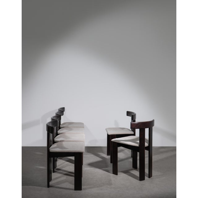Architecturel set of 6 'T-chair' dining chairs in dark stained ash and warm gray fabric upholstery. A characteristic...