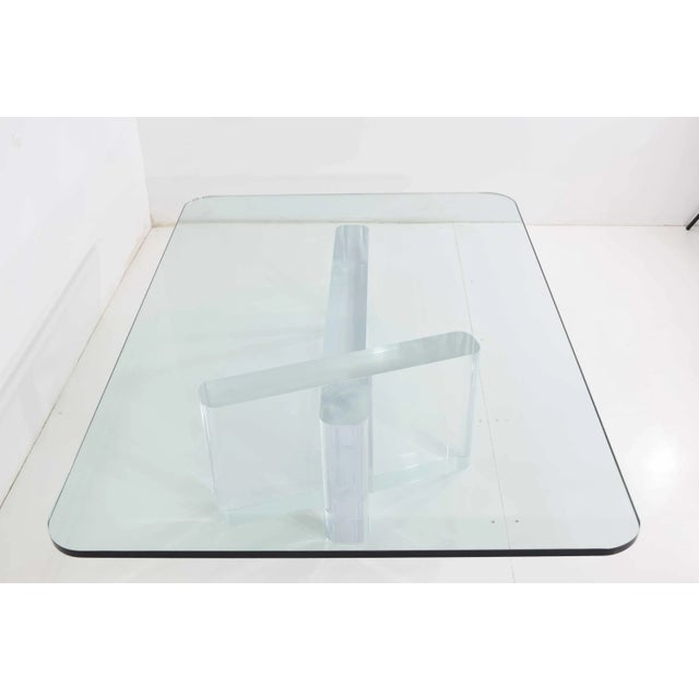 Elevate your living space with the Lion in Frost Signed Thick Lucite Cocktail Table, exclusively available at circa20c....