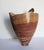 The D. Richardson 2012 Signed Ornamental Hand Turned Wood Vessel is a medium-sized, original sculpture vase made of Acacia...