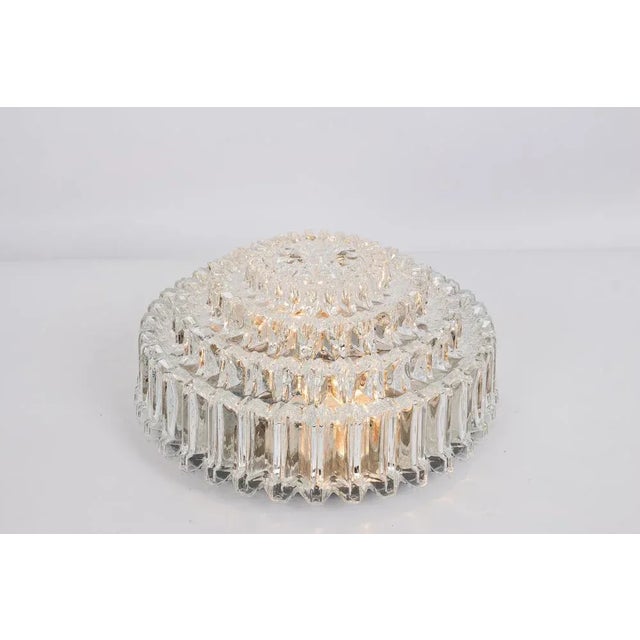 A wonderful flush mount by limburg, germany, 1970s. Special glass form on a black color metal base. High quality and in...