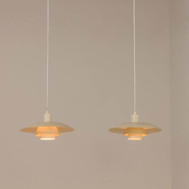The iconic vintage ph 4/3 pendant lamp comes from denmark. This particular vintage pair from the 1970s. It was designed as...