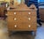 Charming pine washstand, circa 1860. Scrolled detailing frames the top, where a scalloped backsplash holds two small...