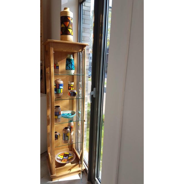 Mid-century pattern Vetrata vases and bowls by Aldo Londi for Bitossi Italy. Black, blue, orange and yellow on a brushed...