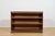 This bookcase was manufactured in Denmark during the 1930s and is designed in the Art Deco style. The piece is...