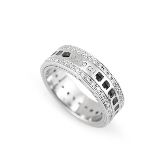 Brand: Gucci Gender: Men's Metal Type: 18K White Gold Ring Size: 10 Width: 7.40 mm Weight: 10.46 grams GUCCI Men's...