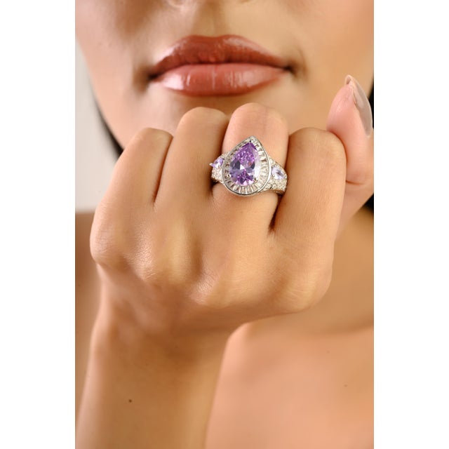 Antique Pear Cut Zirconia Cluster Ring in 925 Sterling Silver. This bold and elegant ring is crafted from high-quality 925...