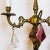 Vintage bronze chandelier-style table lamp in gold with a natural patina from the passage of time and decorated with...