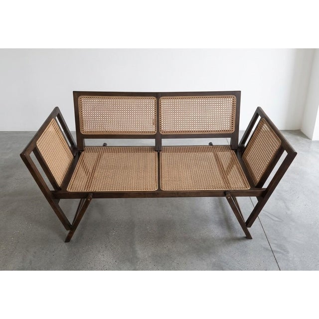Teak and Vienna straw sofa, foldable as shown in the photo. This piece is designed in the style of the selected designer...