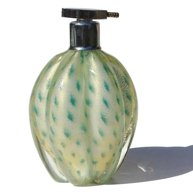 Beautiful vintage Murano hand blown gold flecks and teal green spots Italian art glass vanity perfume atomizer bottle. The...